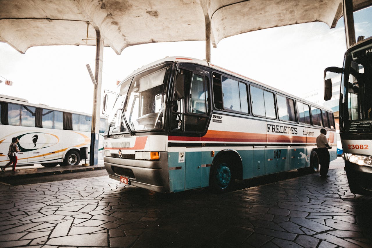 services-04 Colorful bus at an outdoor station captures transportation dynamics.